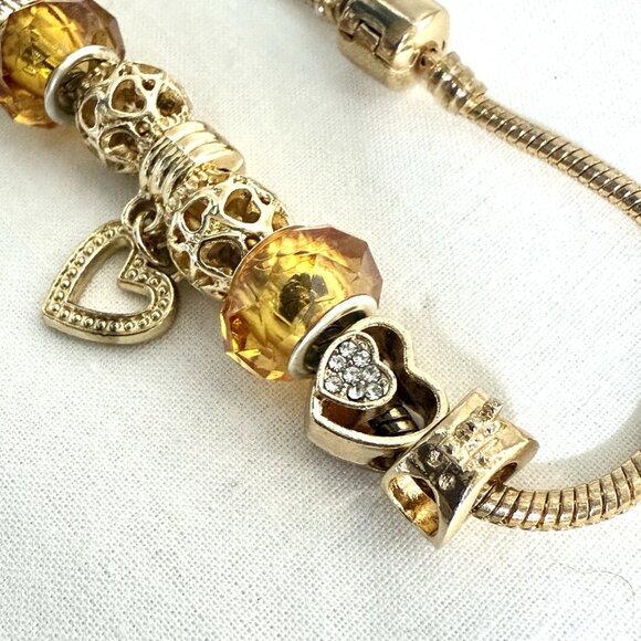 Gold-Tone Slide Charm Bracelet with Amber Crystal & Heart Charms - Picture 4 of 8